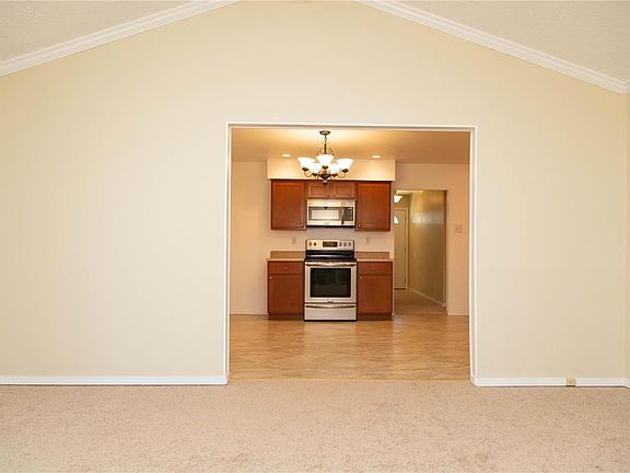 The great room opens to the kitchen.