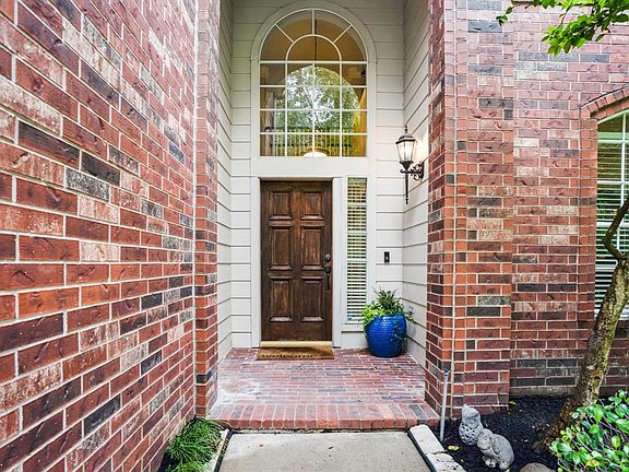 Welcome home, the front door to the home has a covered porch.