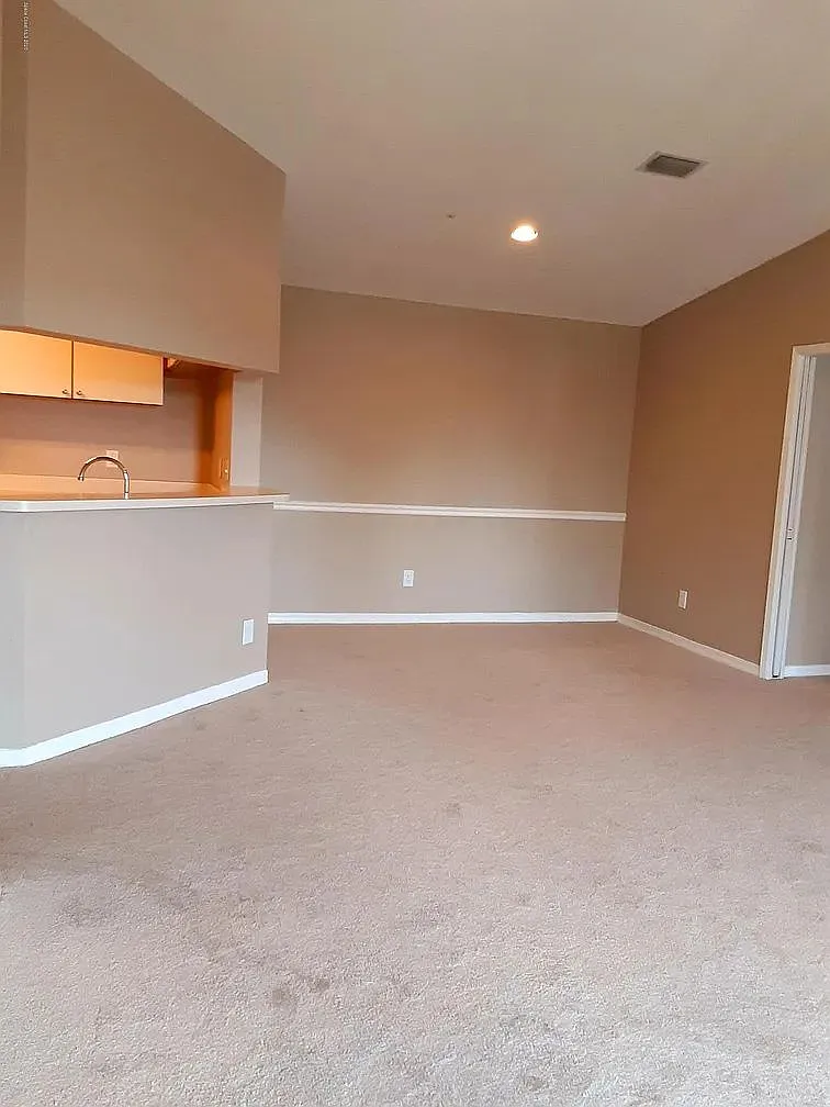 7667 N Wickham Rd — Photo 2
