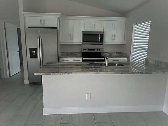 3rd image of 859 NE 6th Pl