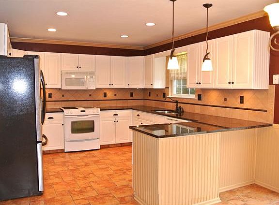 Kitchen with granite, tile backsplash&flooring