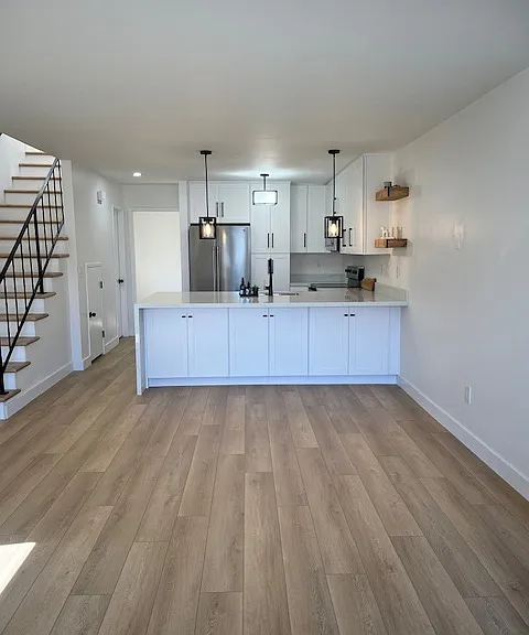 Bright, airy and spacious open concept living room, dining area and kitchen with 1 bedroom and 1 bathroom on the main level