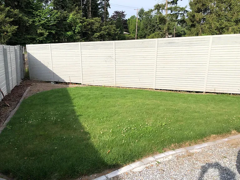 Side yard. Currently now has 2 large garden beds
