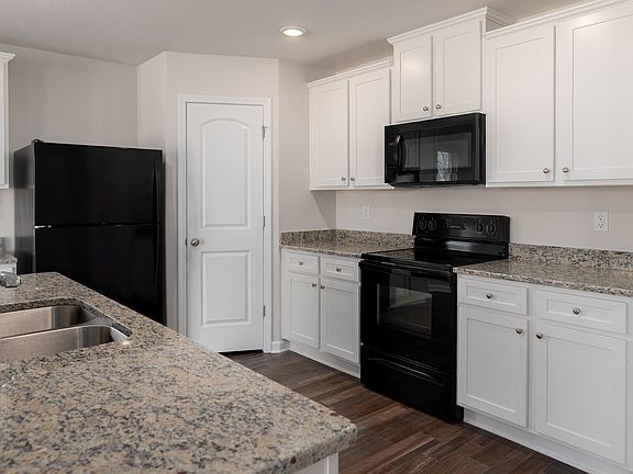 Kitchen also includes granite countertops