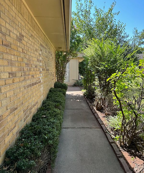 Just past your iron gate entry to your walk way up to front door