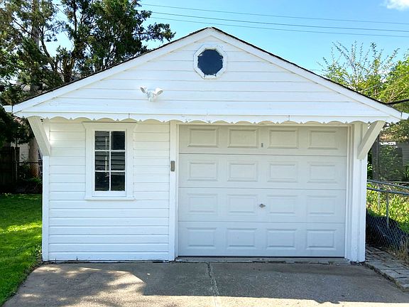 1.5 car garage has electricity & remote opener.