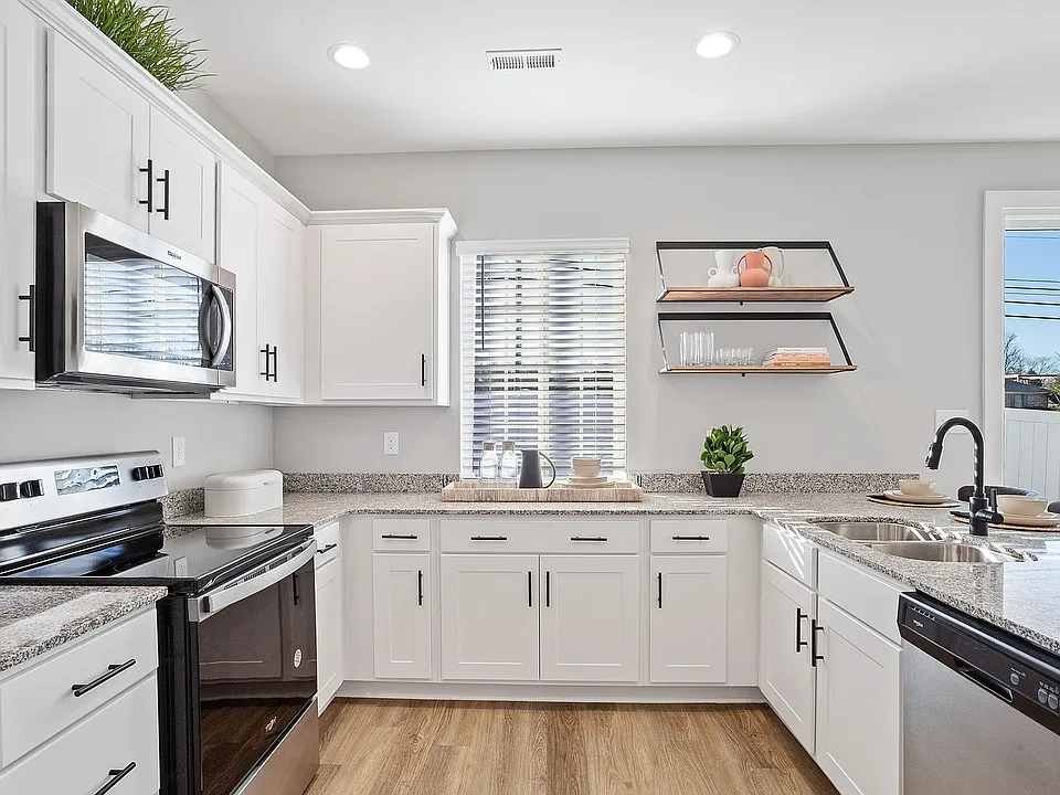 White Cabinetry Kitchens with Ample Natural Lighting