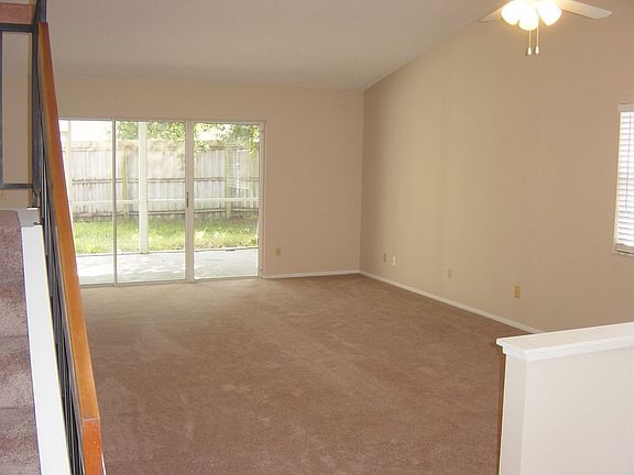 Living Room- New Paint, Carpet, Ceiling Fan, Outlet covers