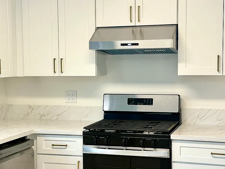 Gas stove and oven with over the range hood