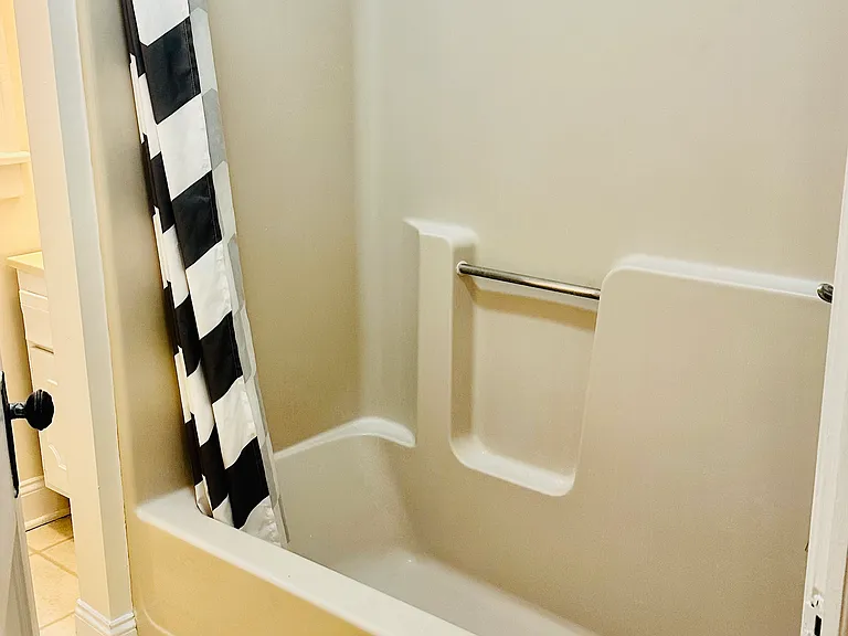 Large bathtub and shower