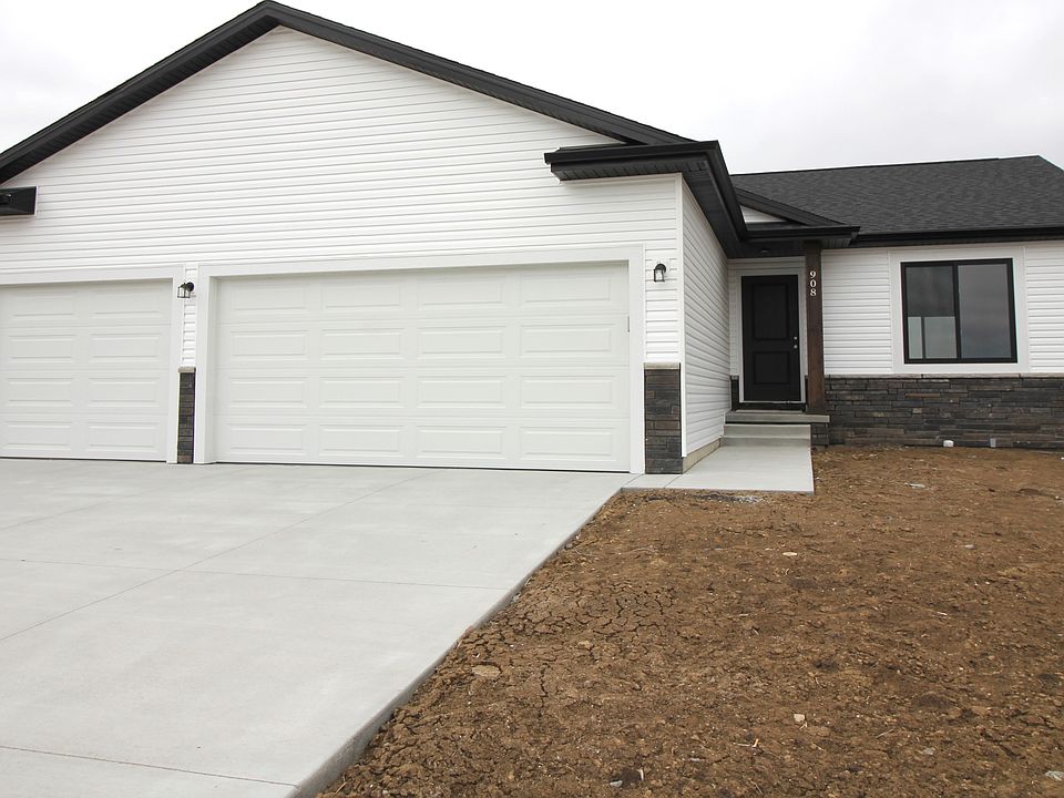 Image shows added third-stall garage.