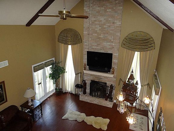 living room with HIGH ceilings
