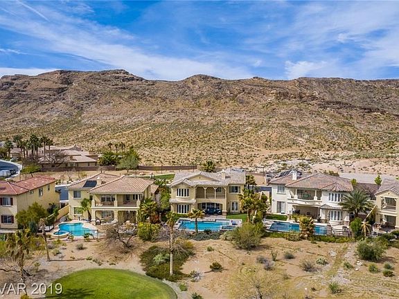 Aerial View of Unobstructed Mountains, Golf Course and Tee Box One