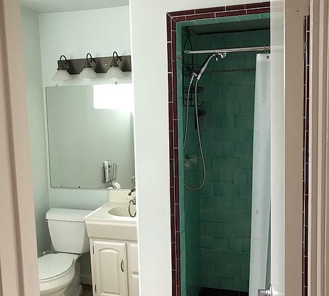 Own bathroom with shared shower.