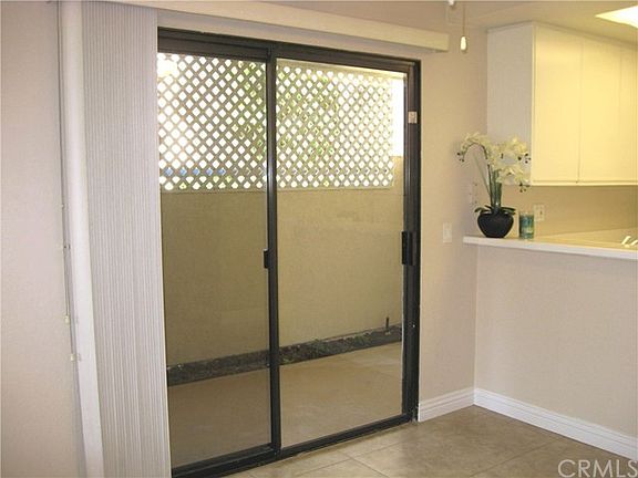 Private patio w/storage closet off dining area.
