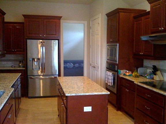 Granite countertops, stainless steel appliances