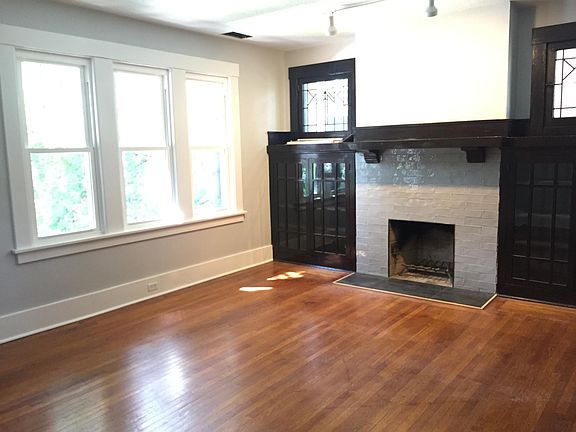 Living room,  Log burning fireplace,  13'x16 feet