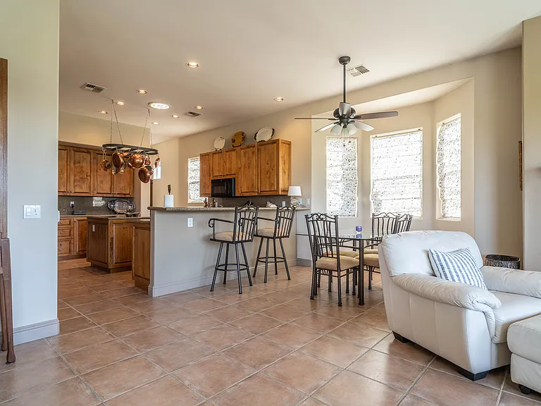 Easy flow between kitchen, dining nook and family room. There is also a formal dining room.