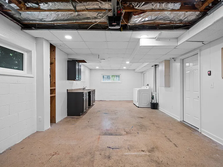 Garage / Laundry located downstairs
