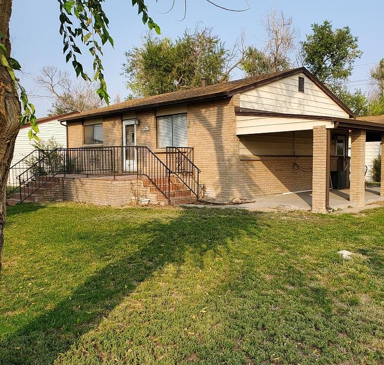 Huge corner lot with fenced in yard, brick deck and huge side patio