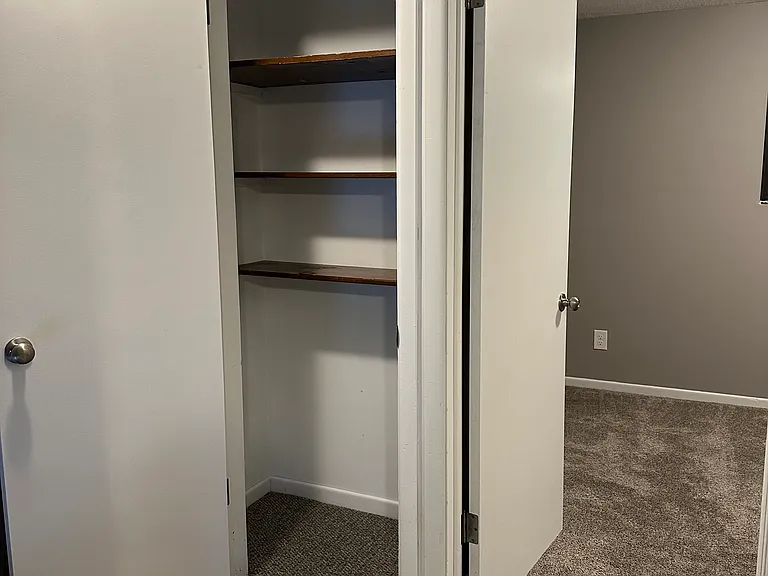 Linen closet upstairs in updated townhome.