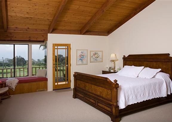 Master bedroom with ocean view deck