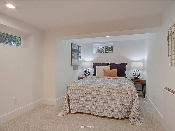 Bedroom 1 (unfurnished) BEFORE window upgrade. The far window is now 6x larger to meet emergency codes and add even more light!