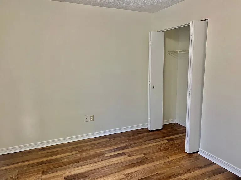 1ST FLOOR BEDROOM WITH CLOSET VIEW