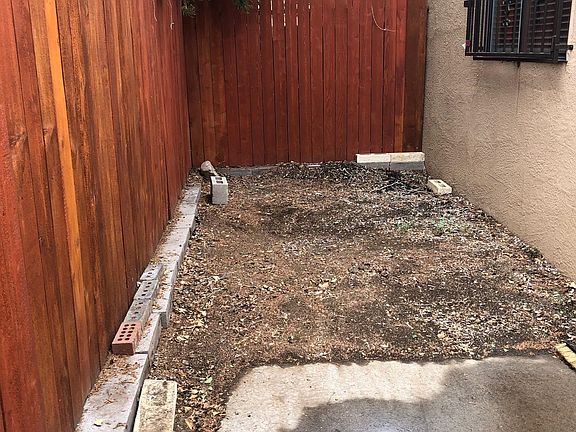 Back patio and small yard.