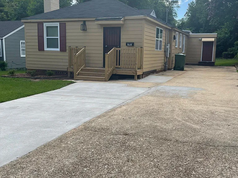 Front of home with 2 car driveway