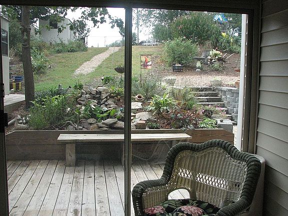 Enjoy the beauty of your back yard from your Sun Room