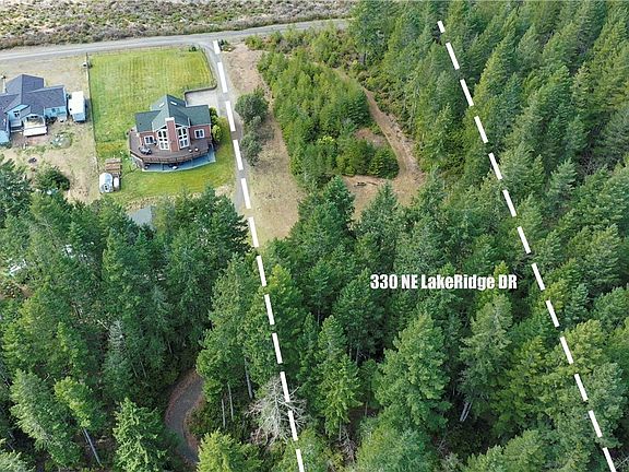 1.69 acre lot from road to lake.