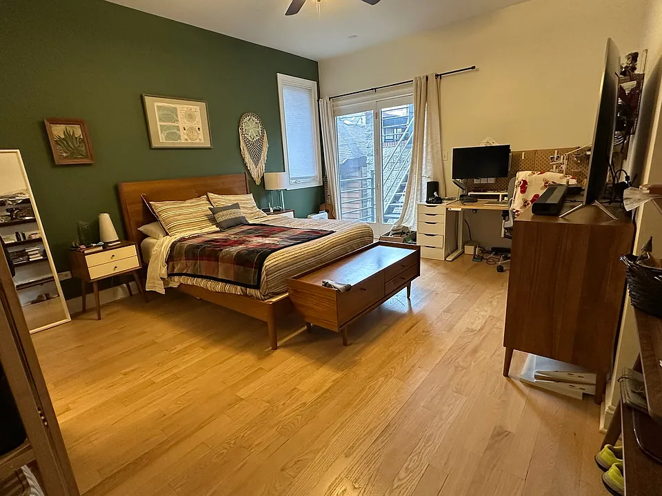 Primary bedroom. Access to private deck.