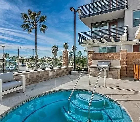 Complex Hot Tub & BBQ area