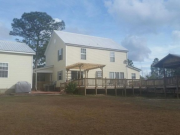 From back (630+ sq ft deck!)