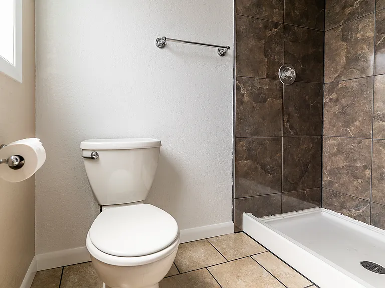 bathroom and shower off of main bedroom