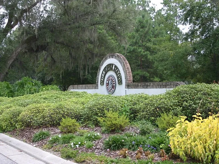 House located in Grand Station at Millhopper Station neighborhood.