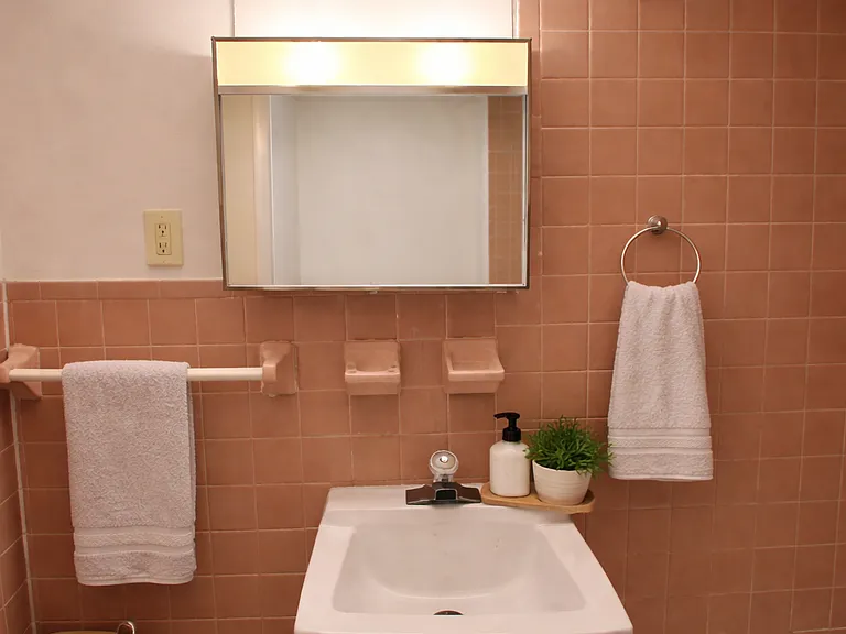 Virtually Staged View of the bathroom from the door