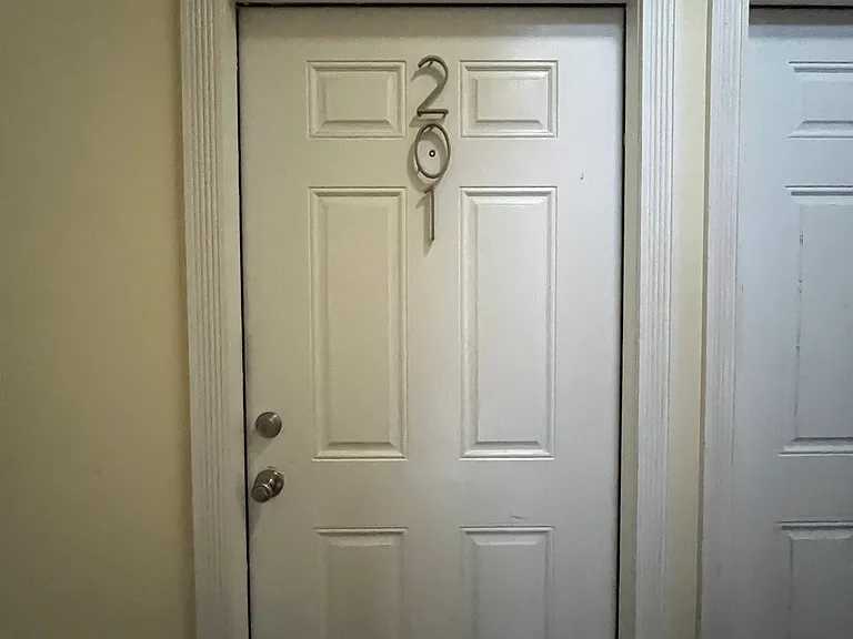Front door to the condo unit 201