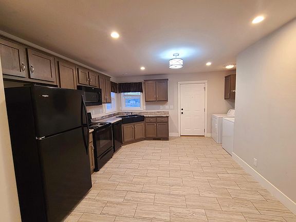 Tile floor in the living room and kitchen