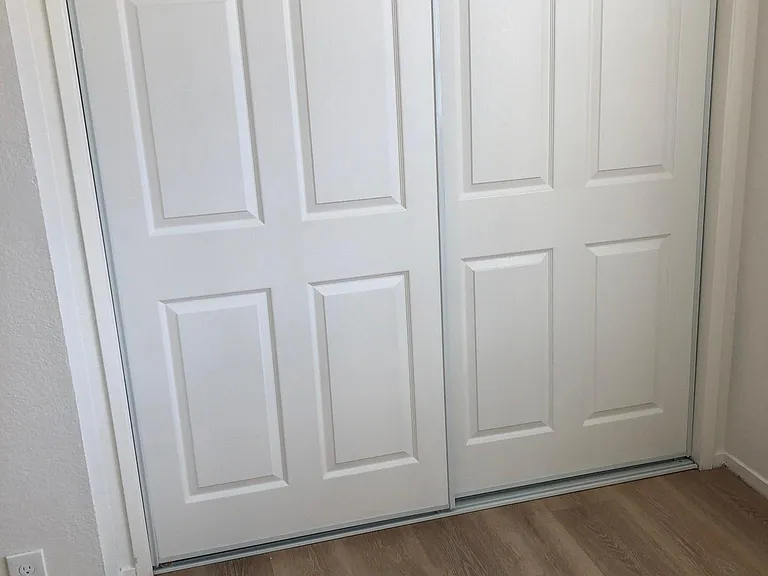 New flooring and closet doors in Bedrooms