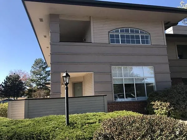 View of the townhome from the outside. Big lower patio