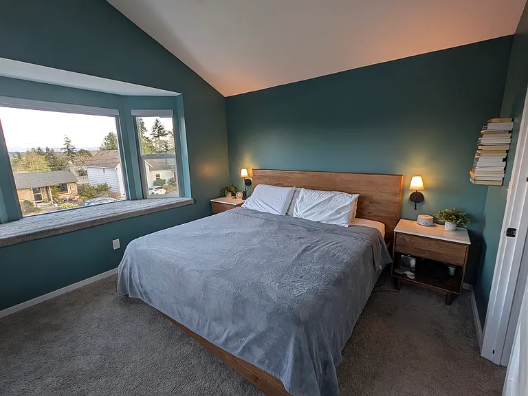 Primary bedroom (upstairs). Automated blinds.