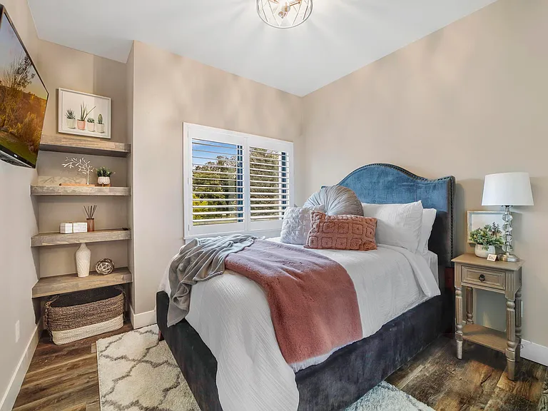 Bedroom $2 With Full Size Plush Bed, Closet, & Mounted TV