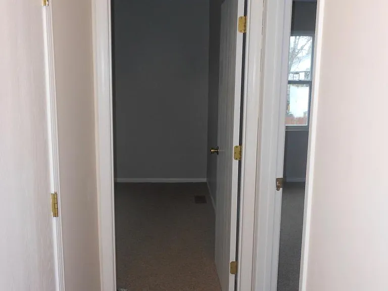 Hall to two large bedrooms at front of house
