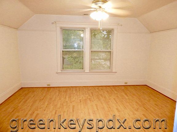 Large living room with peaceful view of trees