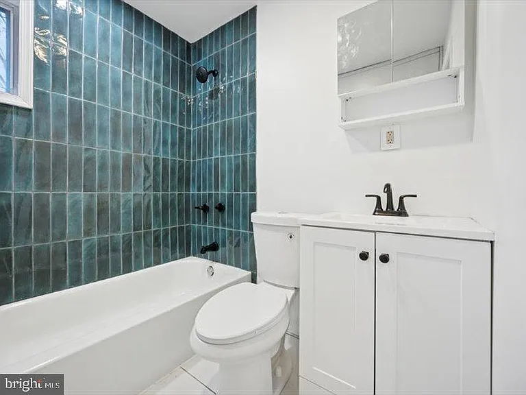 2253 N Delhi St — Photo 5
