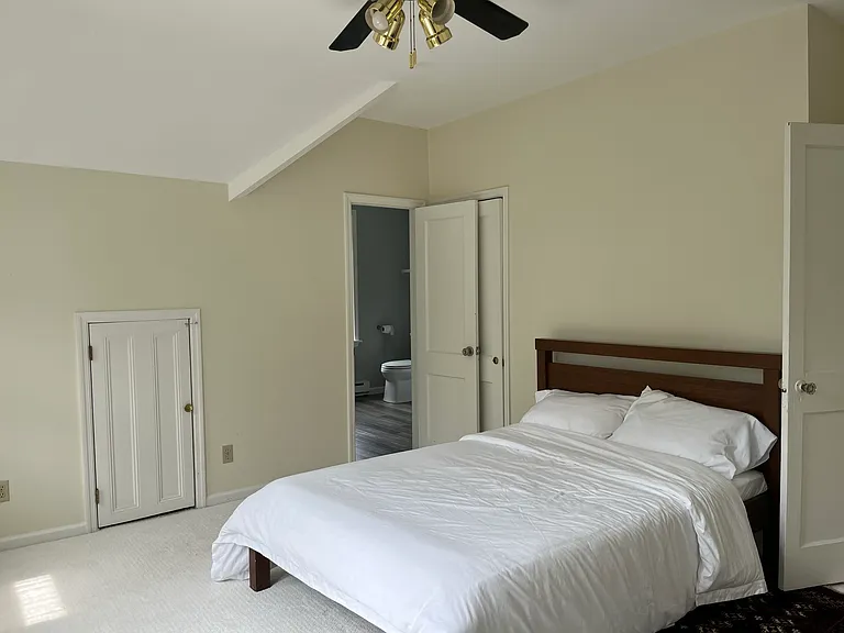 9 x 6 ft storage room behind low door on the left