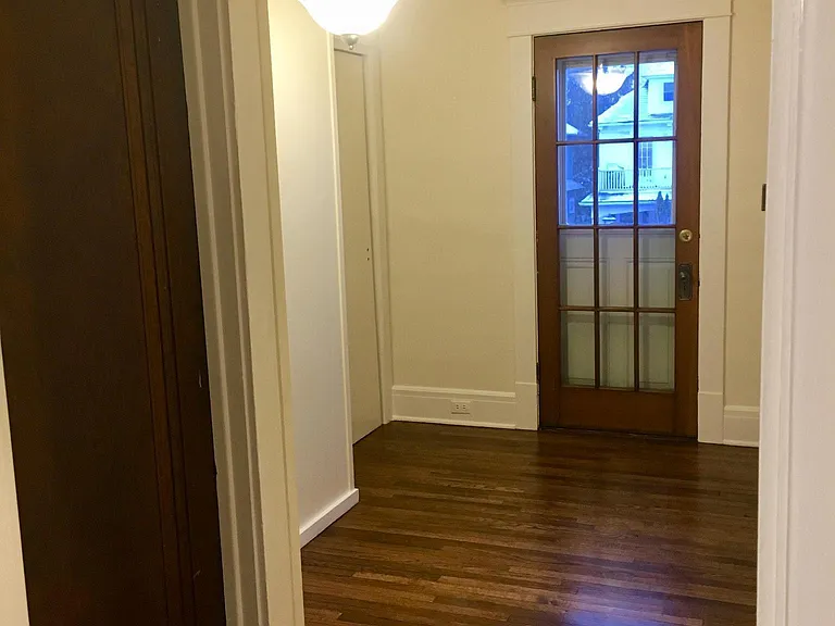 Foyer w/coat closet leading to porch