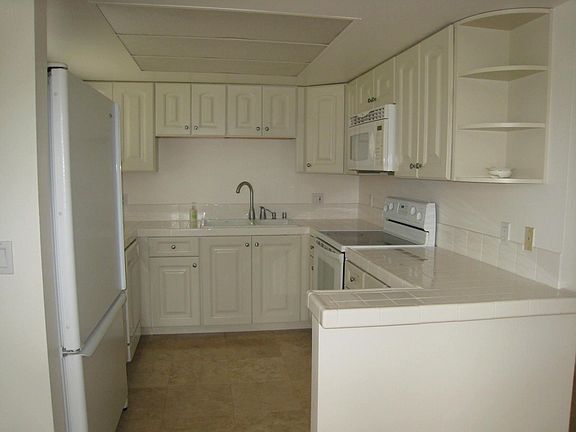 Kitchen with Custom Counter and Cabinets